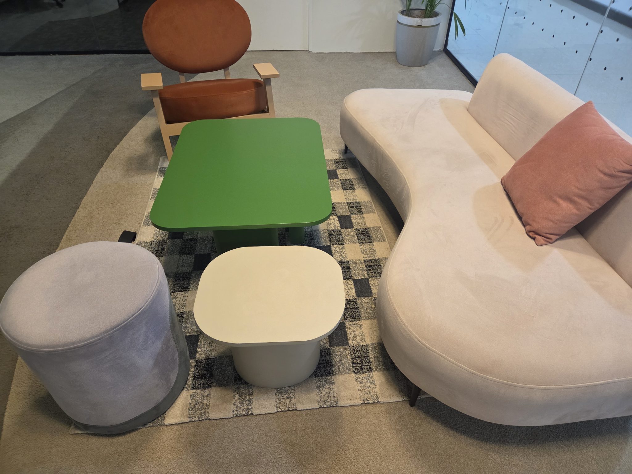 Curved beige sofa used in a Pinterest pin example