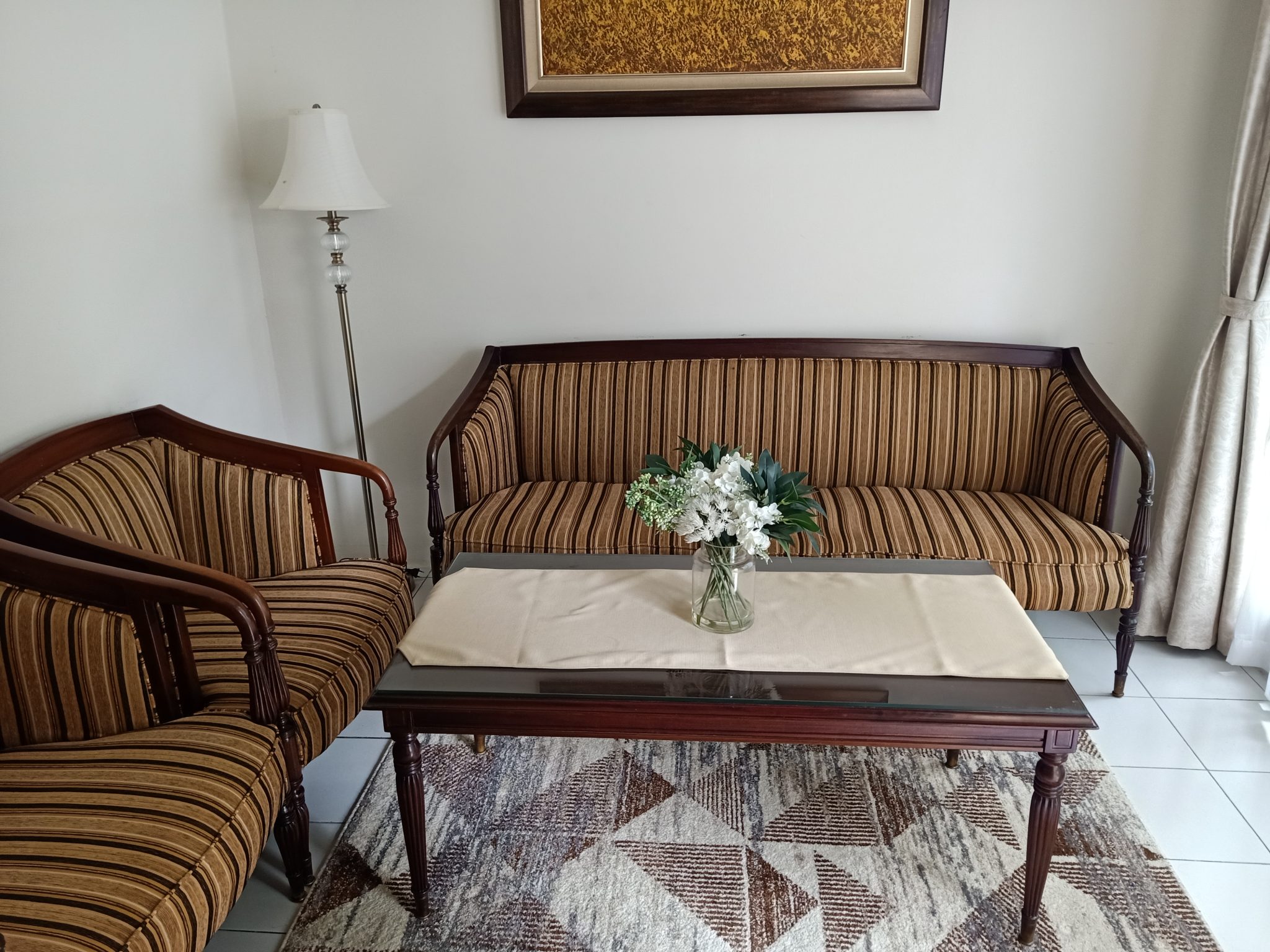 Striped sofa used in a Pinterest pin example