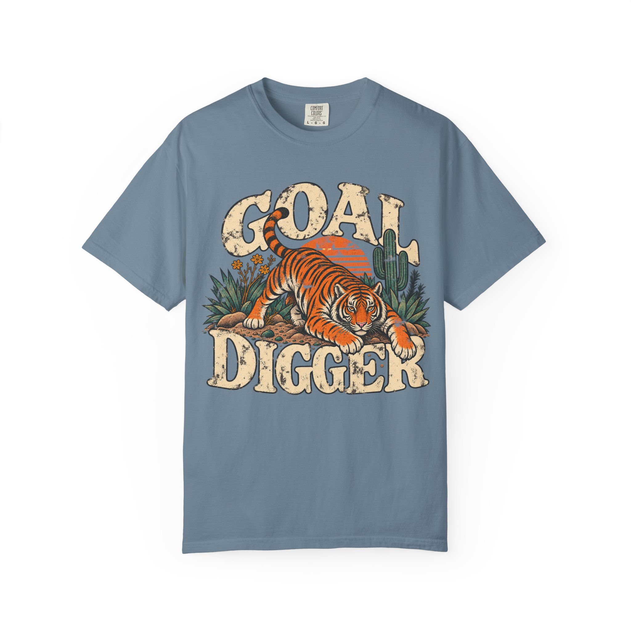 Blue Goal Digger T-shirt with cream lettering and a tiger illustration on the front.