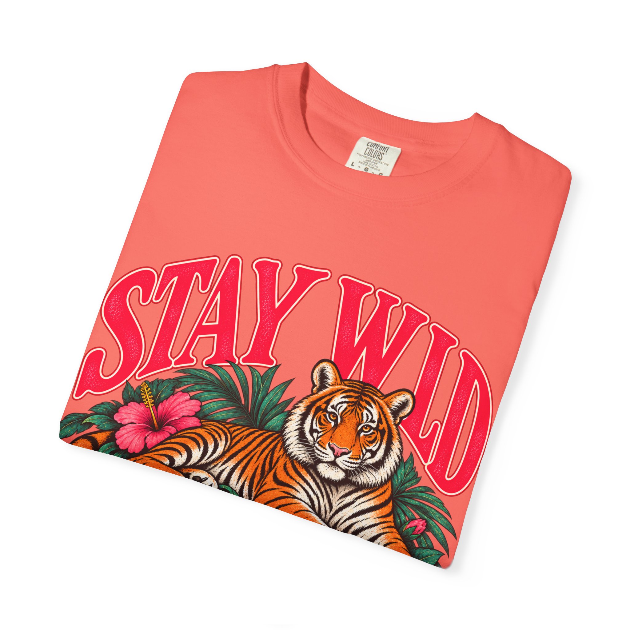 Coral Stay Wild T-shirt, folded to show the front design.