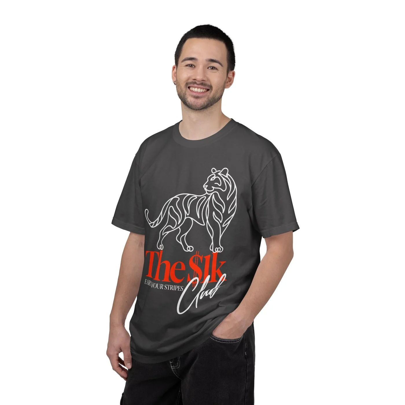 A man wearing the graphite $1K Club winner shirt: a white line tiger above The $1k Club and Earn your stripes.